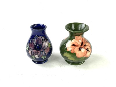 Lot 5521 - MOORCROFT; two vases including a baluster vase...
