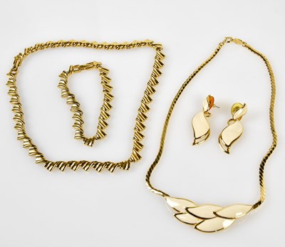 Lot 853 - NAPIER; a gold tone necklace with matching...