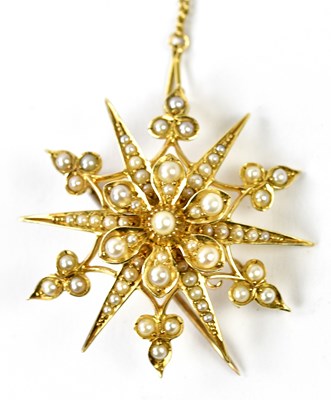 Lot 588 - A 15ct yellow gold and seed pearl star...