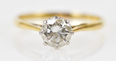 Lot 62 - An 18ct yellow gold platinum tipped diamond...