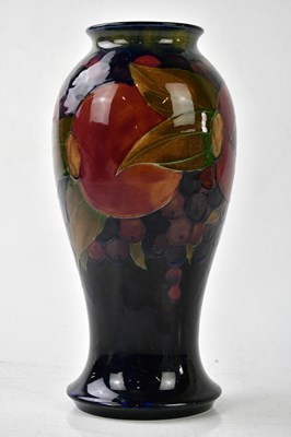 Lot 5503 - WILLIAM MOORCROFT; a vase decorated in the...