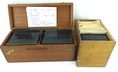 Lot 550 - Two wooden cases containing early 20th century quarter plates negatives