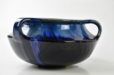 Lot 5477 - DENBY; a blue glazed Arts and Crafts style...