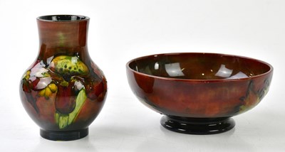 Lot 5517 - WALTER MOORCROFT; a baluster vase decorated in...