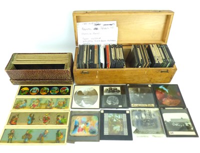 Lot 542 - A wooden box of magic lantern slides