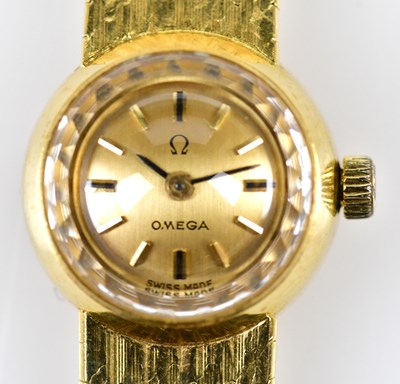 Lot 2878 - OMEGA; a lady's vintage 18ct yellow gold...