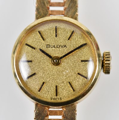 Lot 2891 - BULOVA; a lady's vintage 9ct gold wristwatch...