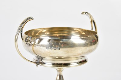 Lot 2360 - A George V hallmarked silver twin handled...