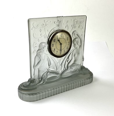 Lot 5504 - An Art Deco frosted glass timepiece decorated...