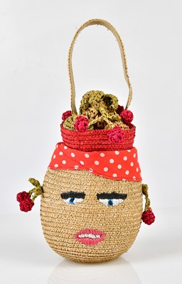 Lot 895 - LULU GUINNESS; a hand woven wheat straw...