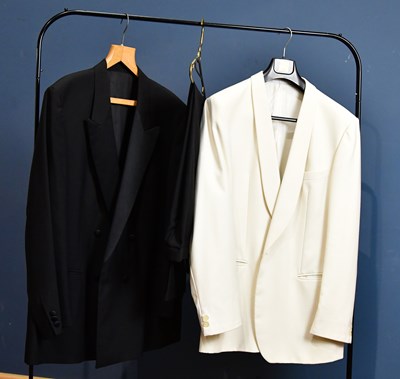 Lot 1009 - CHRISTIAN DIOR; a black 100% wool double...