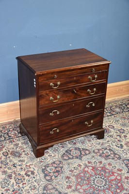 Lot 6651 - A mahogany chest of drawers, with slide above...