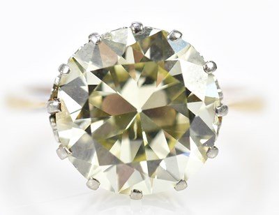Lot 23 - An 18ct yellow gold diamond solitaire ring,...