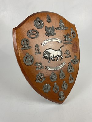 Lot 5128 - An easel back presentation shield with various...