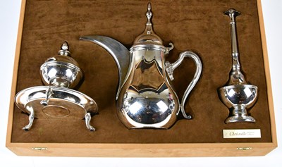Lot 2713 - CHRISTOFLE; an Eastern three piece service...