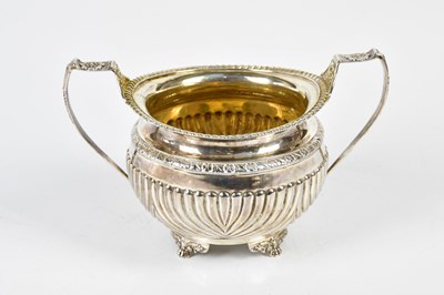 Lot 2097 - A George III hallmarked silver twin handled...