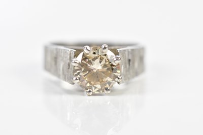 Lot 48 - A white metal diamond solitaire ring, the claw...