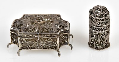 Lot 2517 - A white metal filigree casket with hinged...
