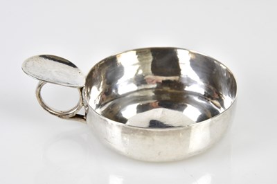Lot 2496 - A French white metal tastevin of plain form,...