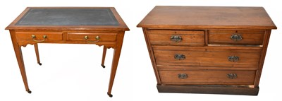 Lot 1718 - An early 20th century oak writing table with...