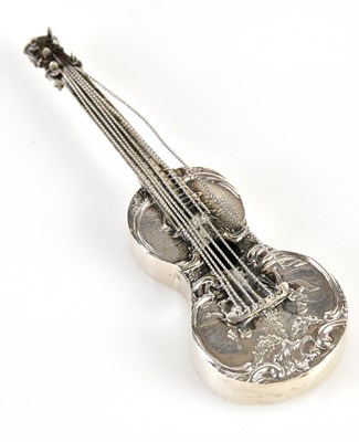 Lot 2480 - A Continental silver model of a guitar, the...