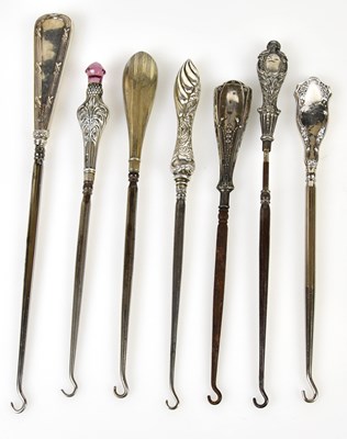 Lot 2491 - Six hallmarked silver handled button hooks and...