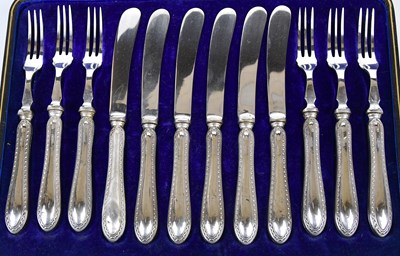 Lot 2760 - A cased set of six hallmarked silver handled...