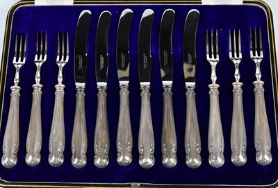 Lot 2761 - A cased set of six hallmarked silver handled...