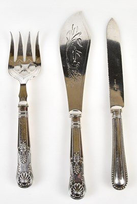 Lot 2751 - A pair of silver handled fish servers, the...