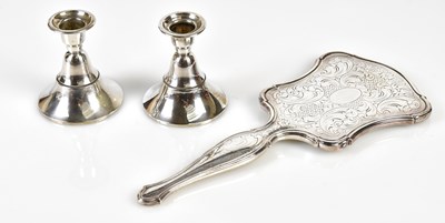 Lot 2182 - A pair of Continental white metal candlesticks,...