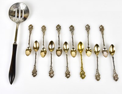 Lot 2752 - A Continental white metal straining spoon with...