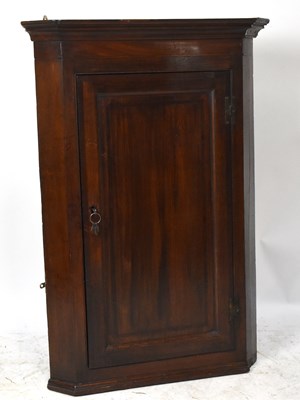 Lot 1485 - An 18th century oak hanging corner cupboard...