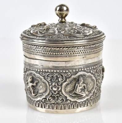 Lot 2400 - An Indian white metal cylindrical jar and...