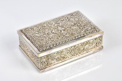Lot 2227 - An Eastern white metal cigarette box, embossed...