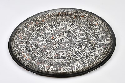 Lot 2811 - An unusual copper dish with white metal inlaid...