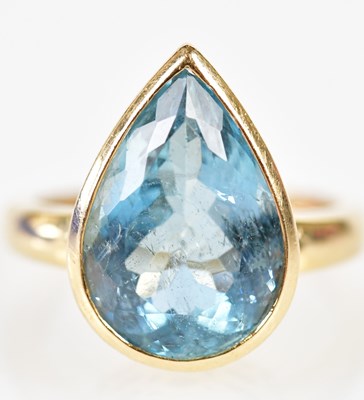 Lot 43 - An 18ct yellow gold and aquamarine ring, the...