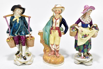 Lot 593 - A 19th century ceramic figure of a gentleman...