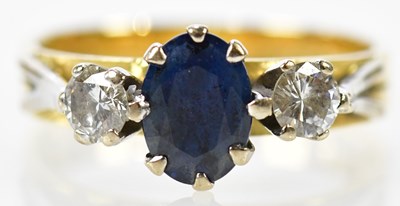 Lot 89 - An 18ct yellow gold sapphire and diamond three...