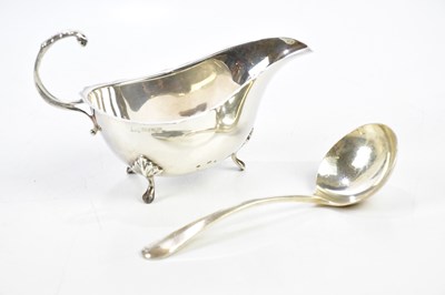 Lot 1080 - An Elizabeth II hallmarked silver sauce boat,...