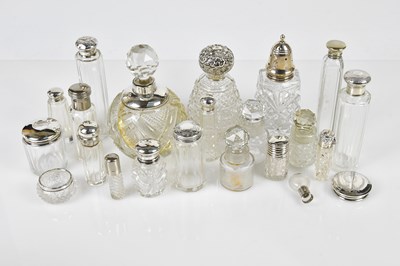 Lot 2354 - A collection of cut and moulded glass perfume...