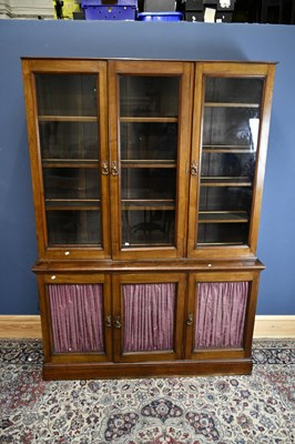 Lot 6573 - A late 19th century walnut two section...