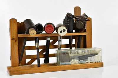 Lot 5066 - A small collection of wooden pipes, one...