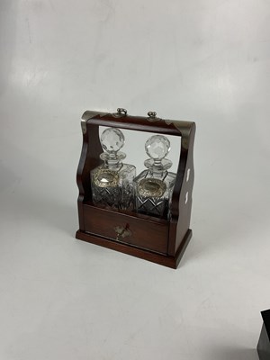 Lot 5097 - A modern mahogany two section tantalus with...