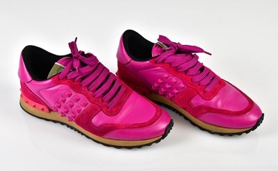 Lot 1070 - GARAVANI VALENTINO; a pair of fuchsia pink...