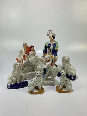Lot 5450 - A small group of Staffordshire figures to...