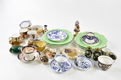 Lot 5451 - ROYAL WORCESTER; a hand painted tea cup and...