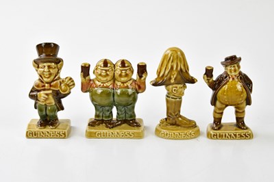 Lot 5377 - WADE; four Guinness advertising figures to...