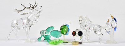 Lot 5542 - SWAROVSKI; a collection of crystal models to...