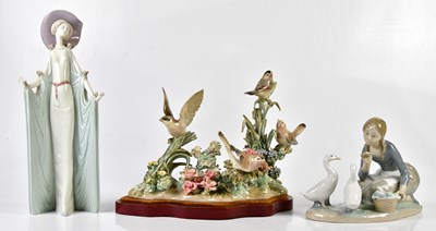 Lot 5393 - LLADRO; a figure representing a girl kneeling...