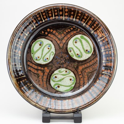 Lot 306 - NIGEL COX; a large stoneware dish covered in...